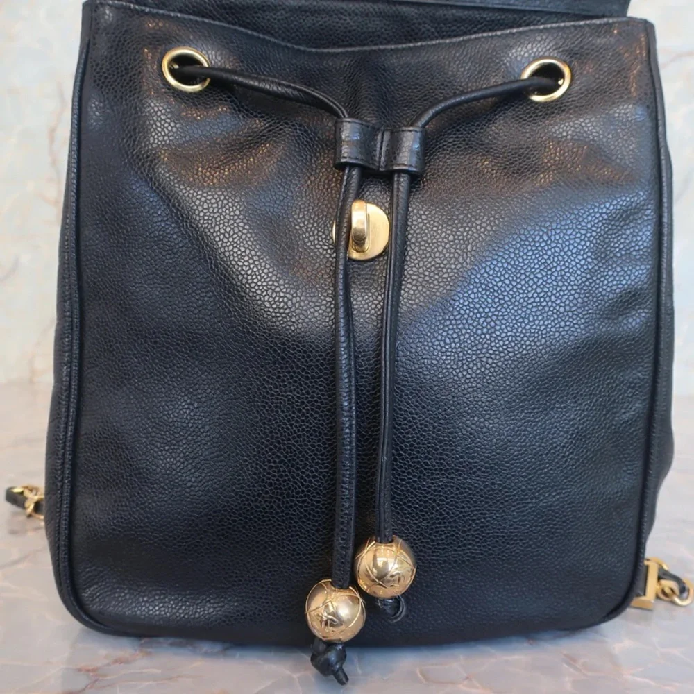 Authentic CHANEL black caviar leather backpack